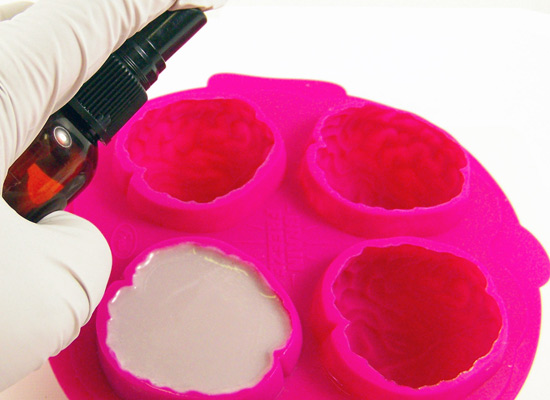 spritz cavities to help soap flow smoothly into the design