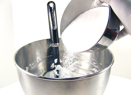 slowly add sugar to whipped base