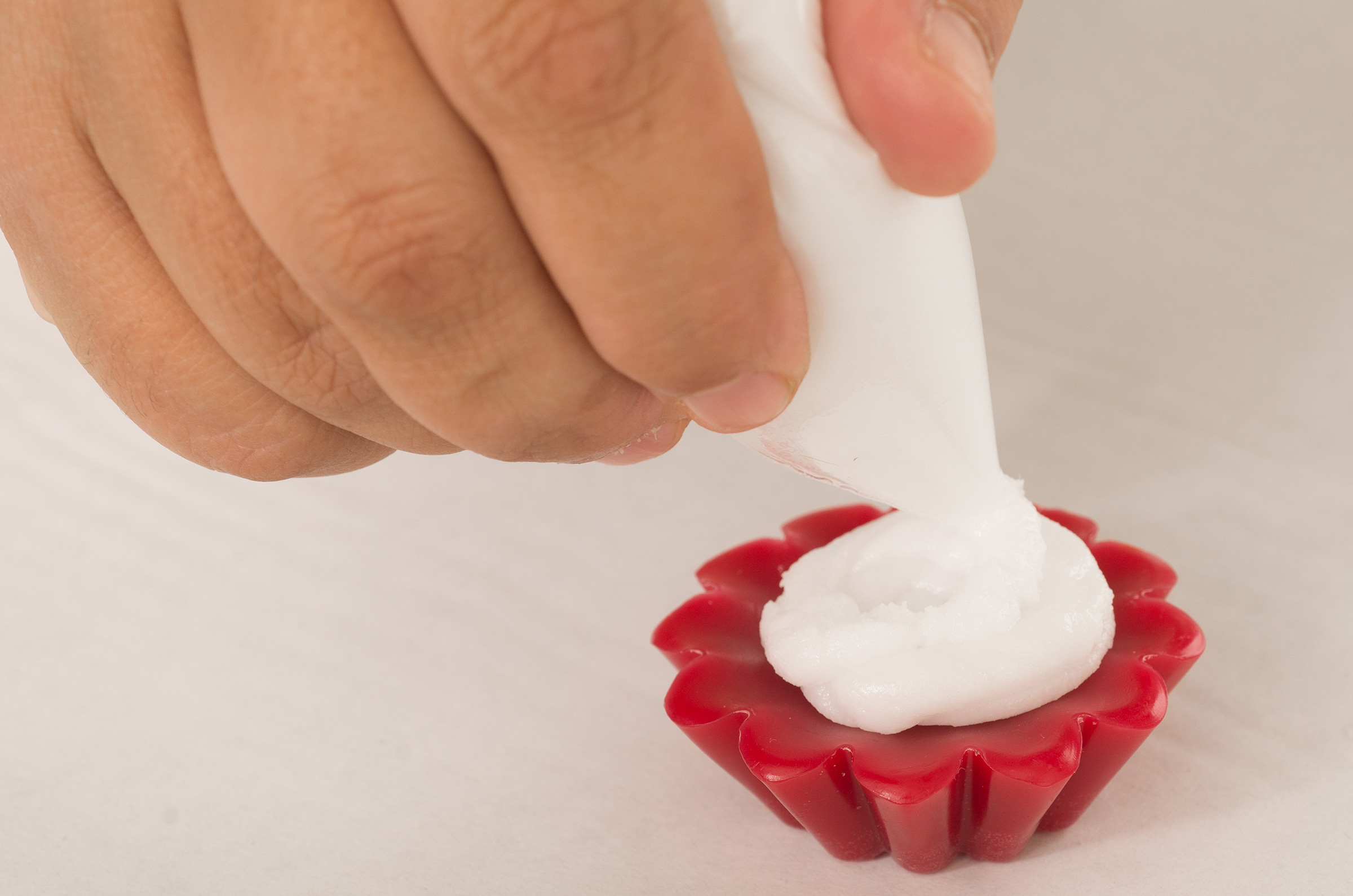 create a whipped wax dollop on top
